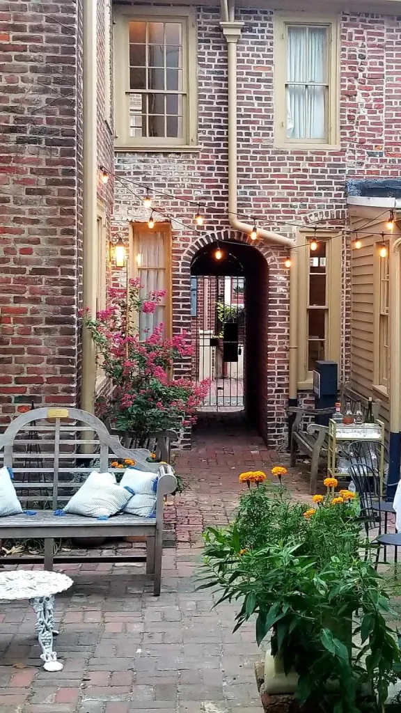 View of Elfreths Alley garden set for a theatrical production.