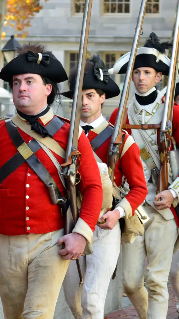 "Redcoats" march through the Museum of the American Revolution's plaza.