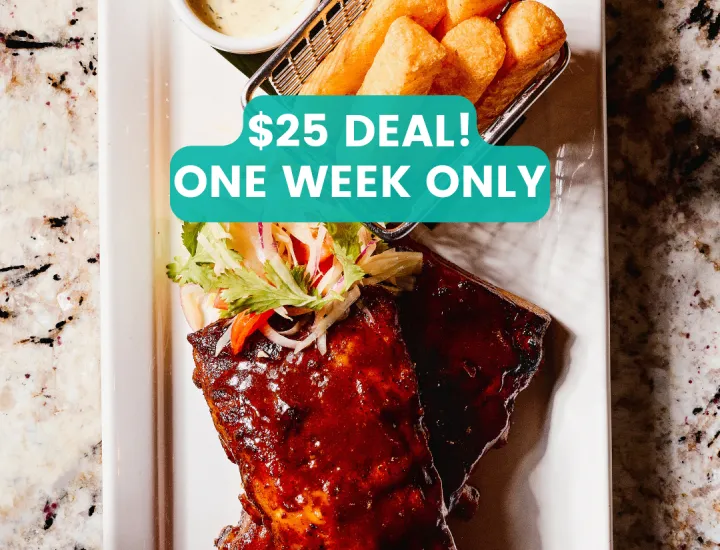 Plate of guava bbq ribs with yuca fries and dipping sauce