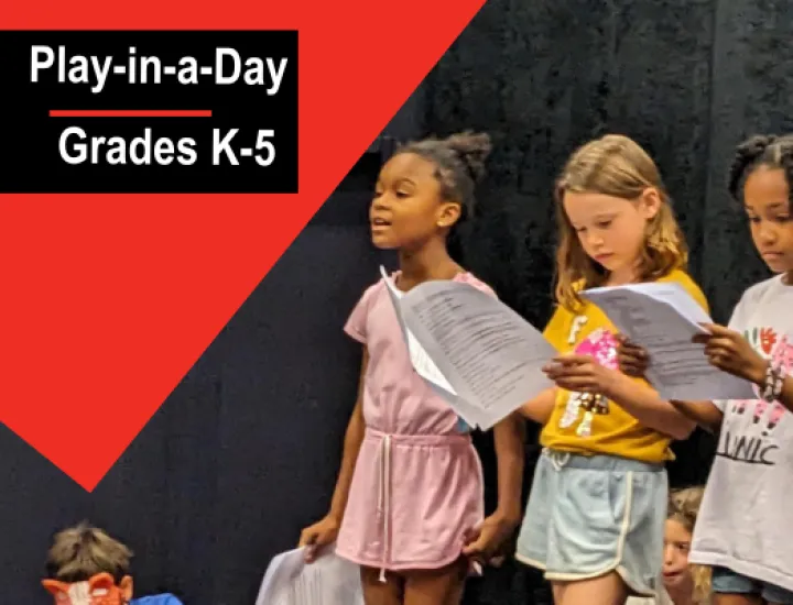 Three children stand while reading aloud from a script.