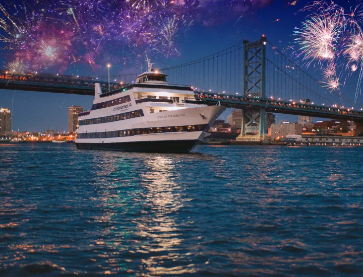 Spirit of Philadelphia vessel with fireworks in the background.